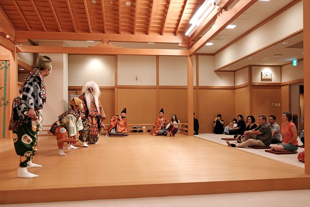 Participants watching a Kagura performance